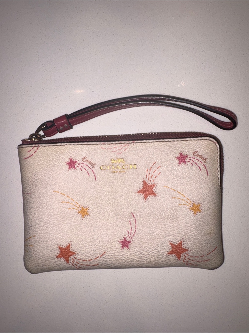 HEAVILY USED Coach Cream Star-Print Wristlet